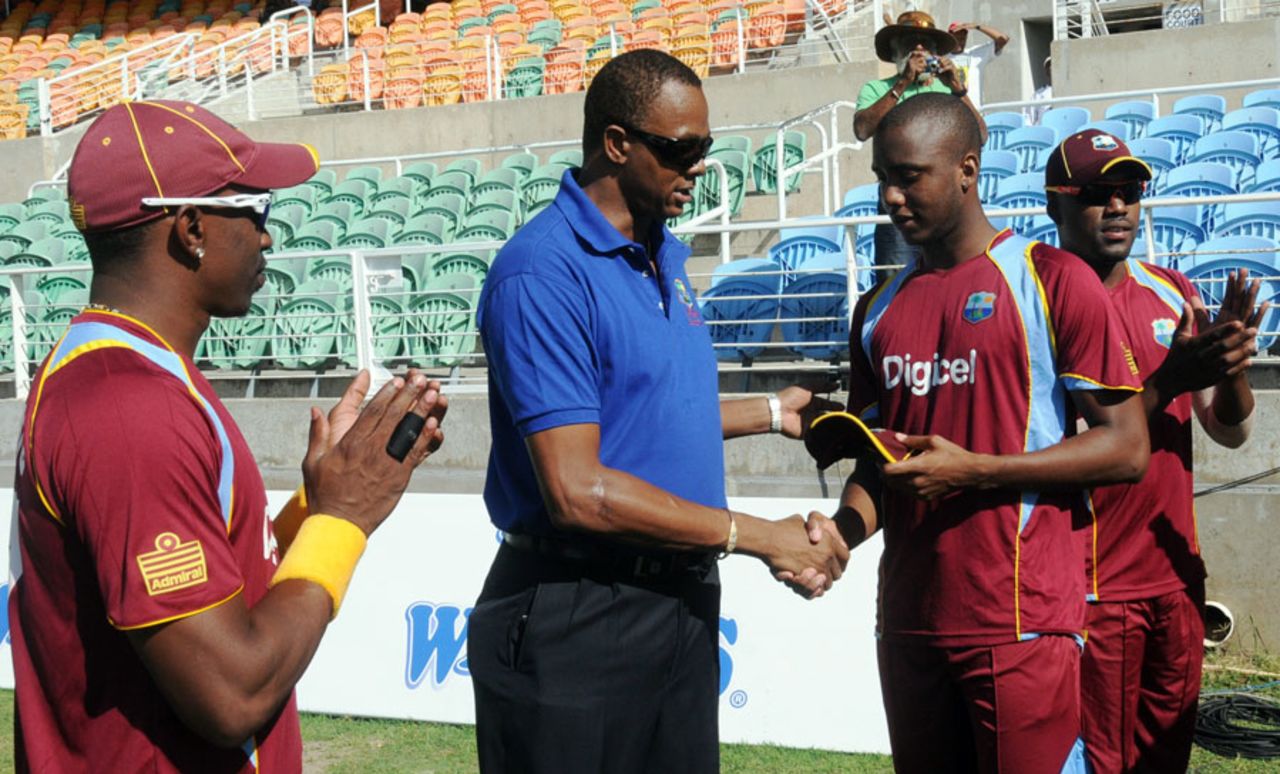 Miguel Cummins gets his ODI cap from Courtney Walsh, West Indies v Ireland, only ODI, Kingston, February 23, 2014