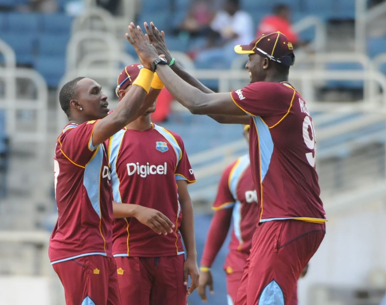 Dwayne Bravo is congratulated after a wicket, West Indies v Ireland, only ODI, Kingston, February 23, 2014