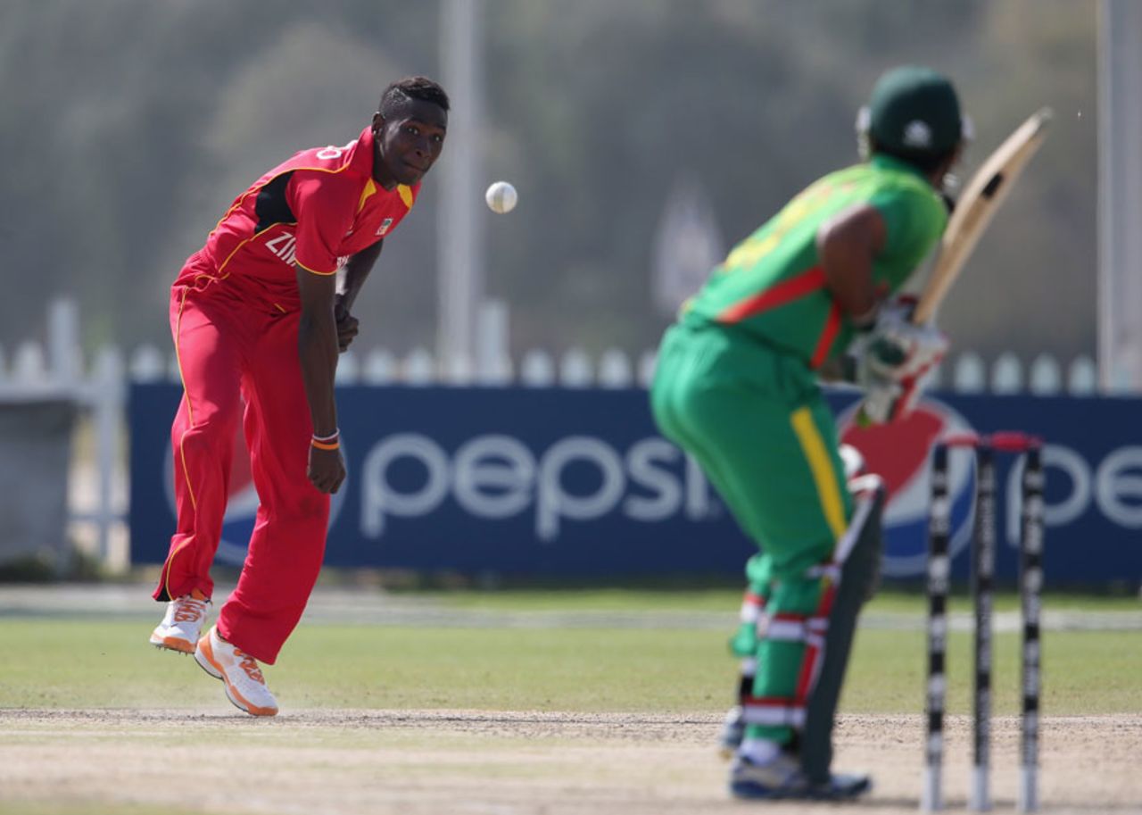 Patrick Mambo has a bowl, Bangladesh v Zimbabwe, 1st Plate Semi-Final, Under-19 World Cup, Abu Dhabi, February 25, 2014