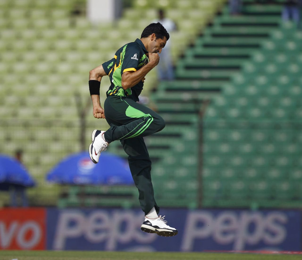 Umar Gul jumps up in celebration after removing Kusal Perera, Pakistan v Sri Lanka, Asia Cup, Fatullah, February 25, 2014