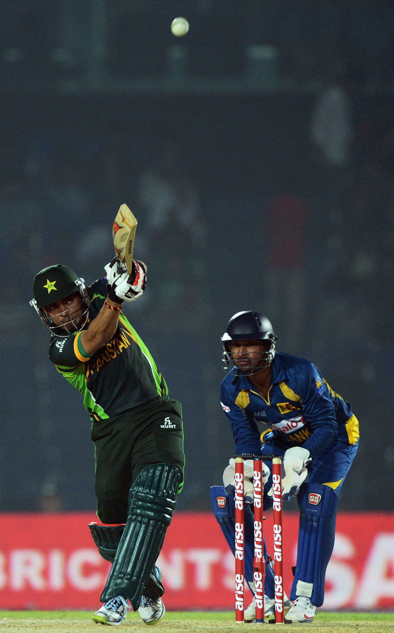 Umar Akmal plays a lofted shot, Pakistan v Sri Lanka, Asia Cup, Fatullah, February 25, 2014