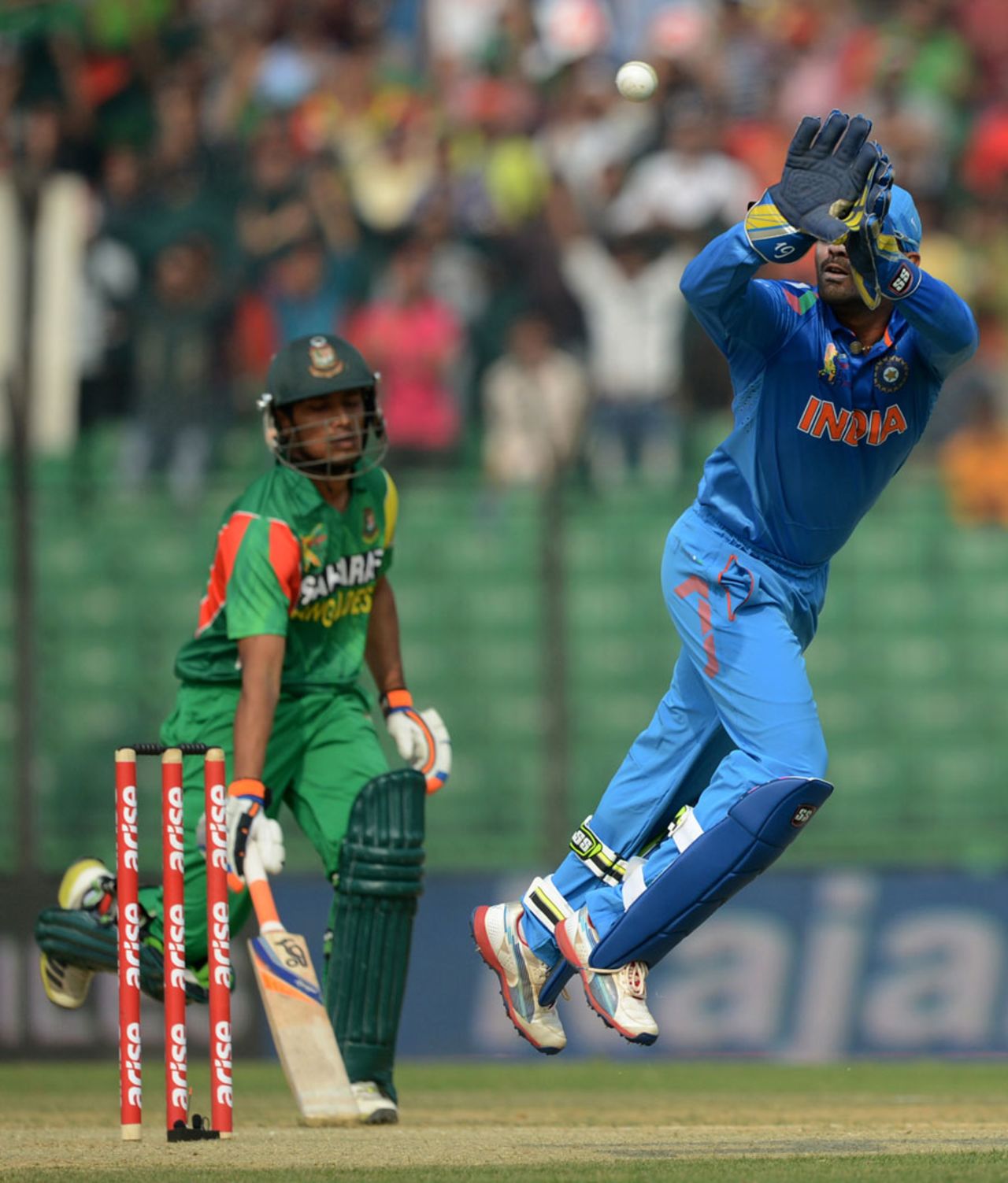 Dinesh Karthik collects the ball, Bangladesh v India, Asia Cup 2014, Fatullah, February 26, 2014