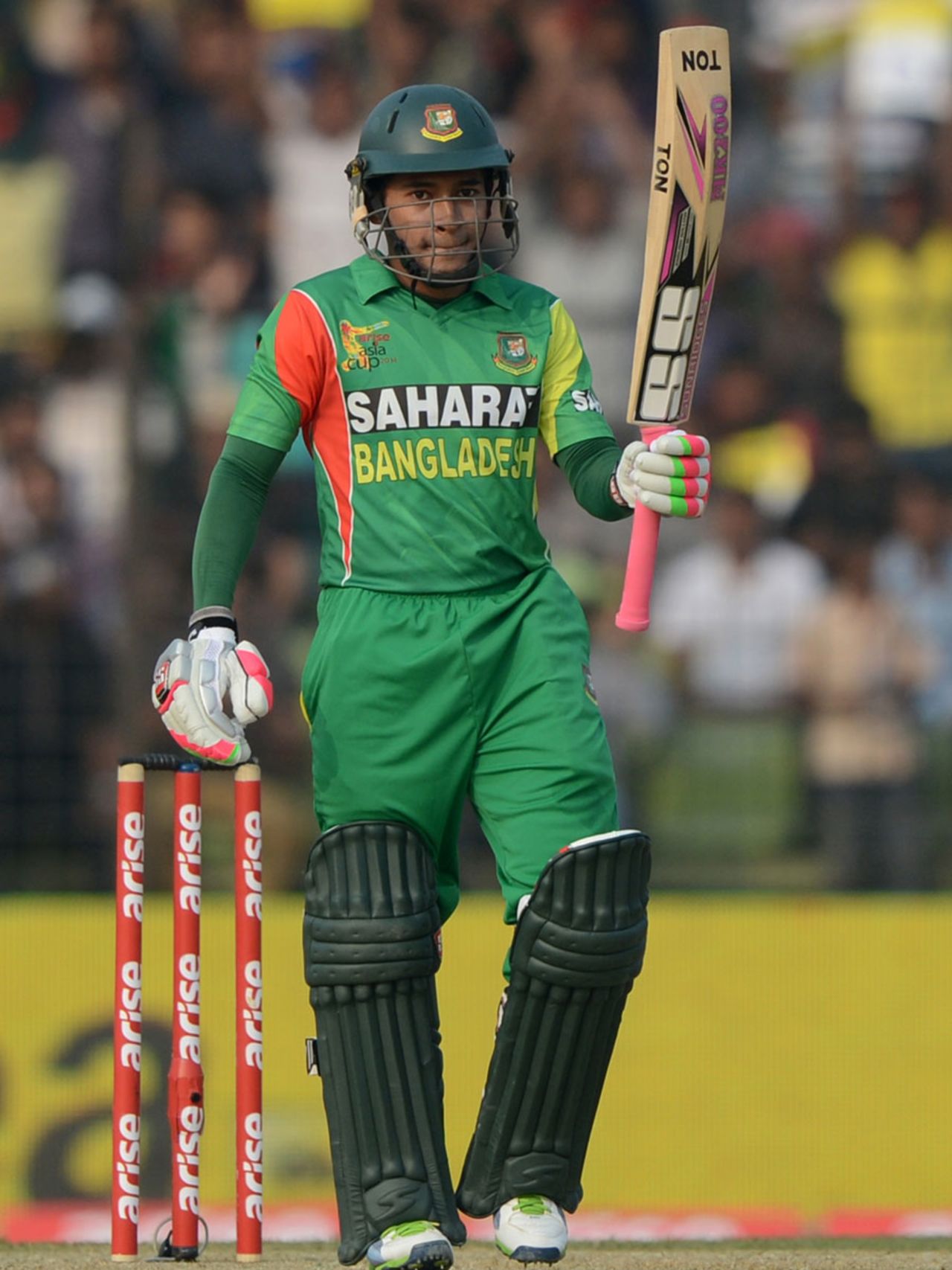 Mushfiqur Rahim raises the bat after reaching his fifty, Bangladesh v India, Asia Cup 2014, Fatullah, February 26, 2014
