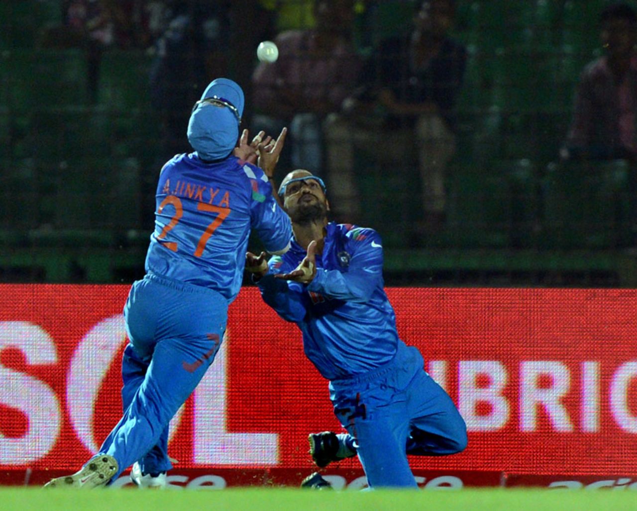 Ajinkya Rahane and Shikhar Dhawan collided as they went for a catch, India v Sri Lanka, Asia Cup, Fatullah, February 28, 2014