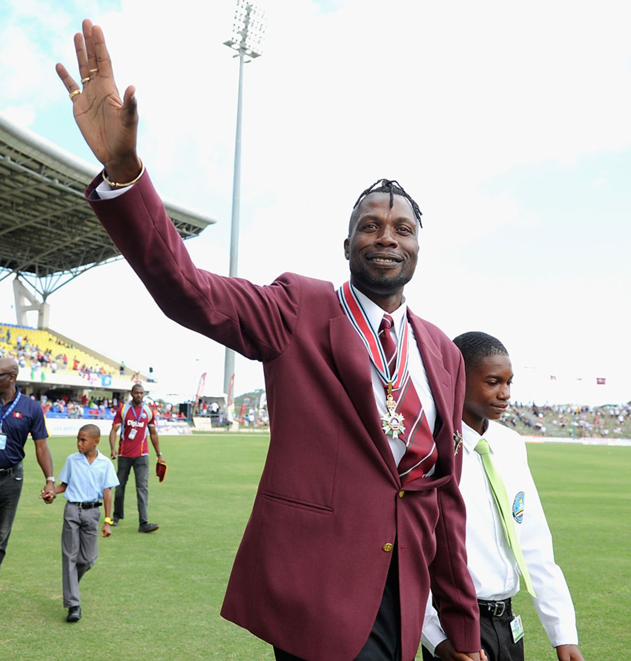 Curtly Ambrose waves to the crowd after his knighthood, West Indies v England, 1st ODI, North Sound, February 28, 2014