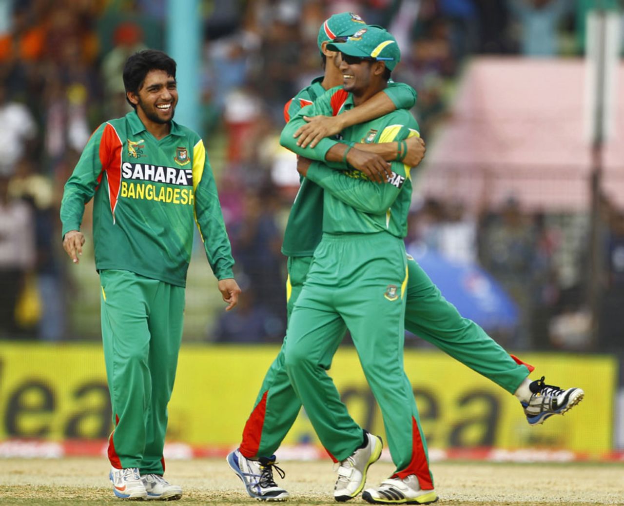 Mominul Haque is congratulated after a wicket, Bangladesh v Afghanistan, Asia Cup, Fatullah, March 1, 2014