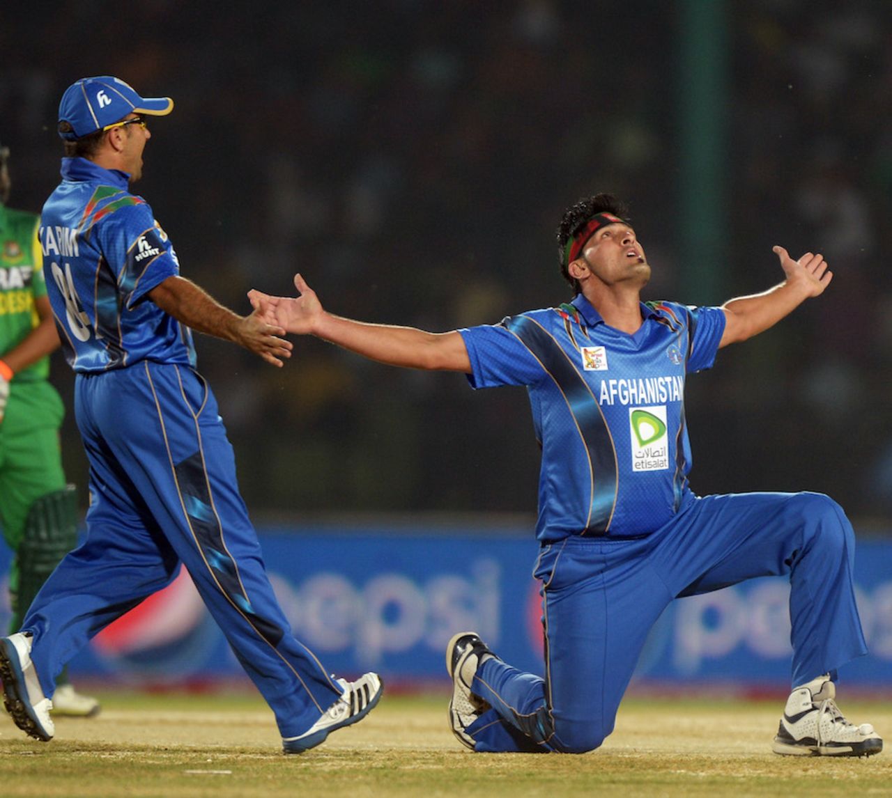 Hamid Hassan celebrates the wicket of Anamul Haque, Bangladesh v Afghanistan, Asia Cup, Fatullah, March 1, 2014