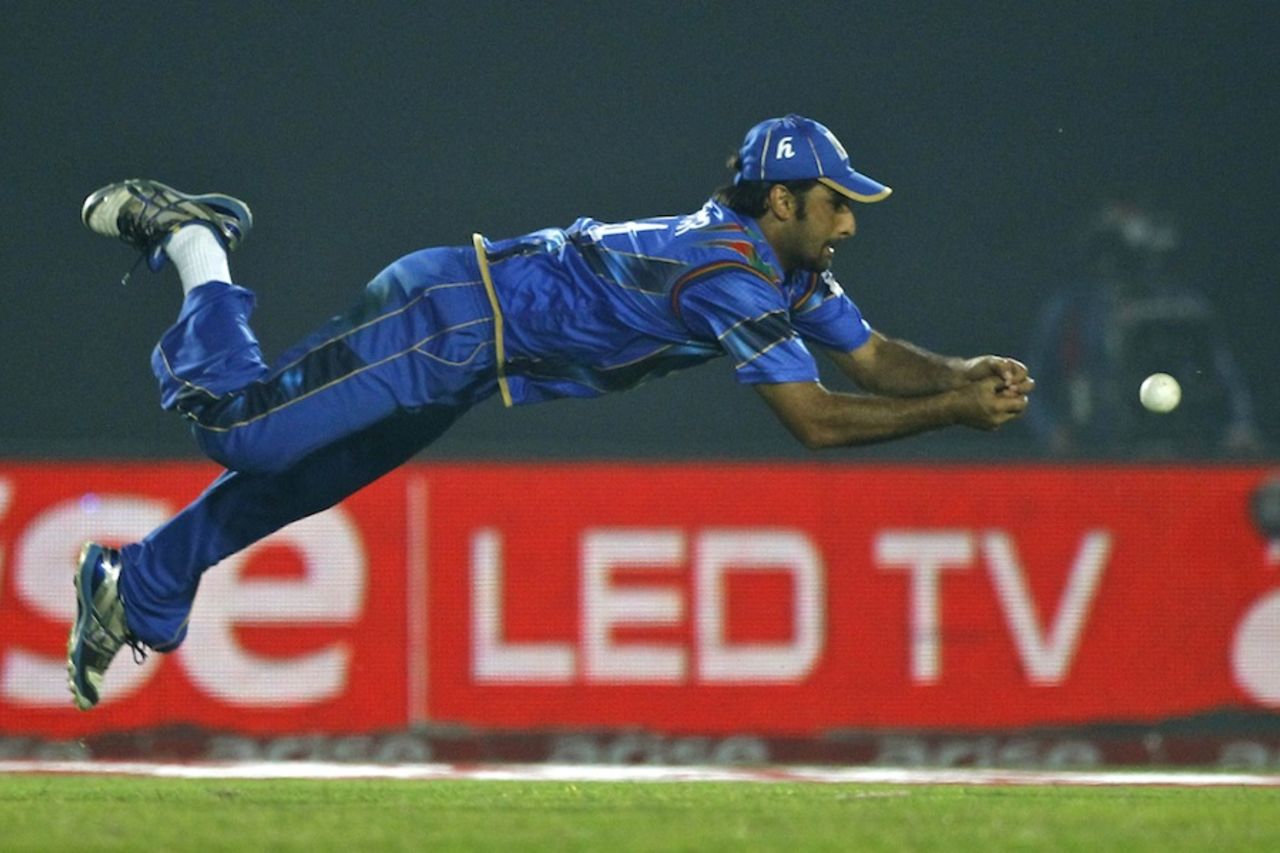 Asghar Stanikzai drops a catch at short third man, Bangladesh v Afghanistan, Asia Cup, Fatullah, March 1, 2014