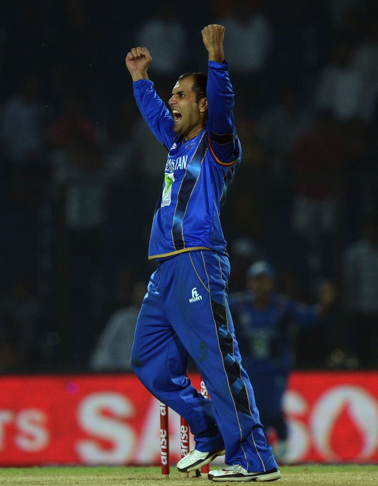 Mohammad Nabi exults after taking the final wicket, Bangladesh v Afghanistan, Asia Cup, Fatullah, March 1, 2014