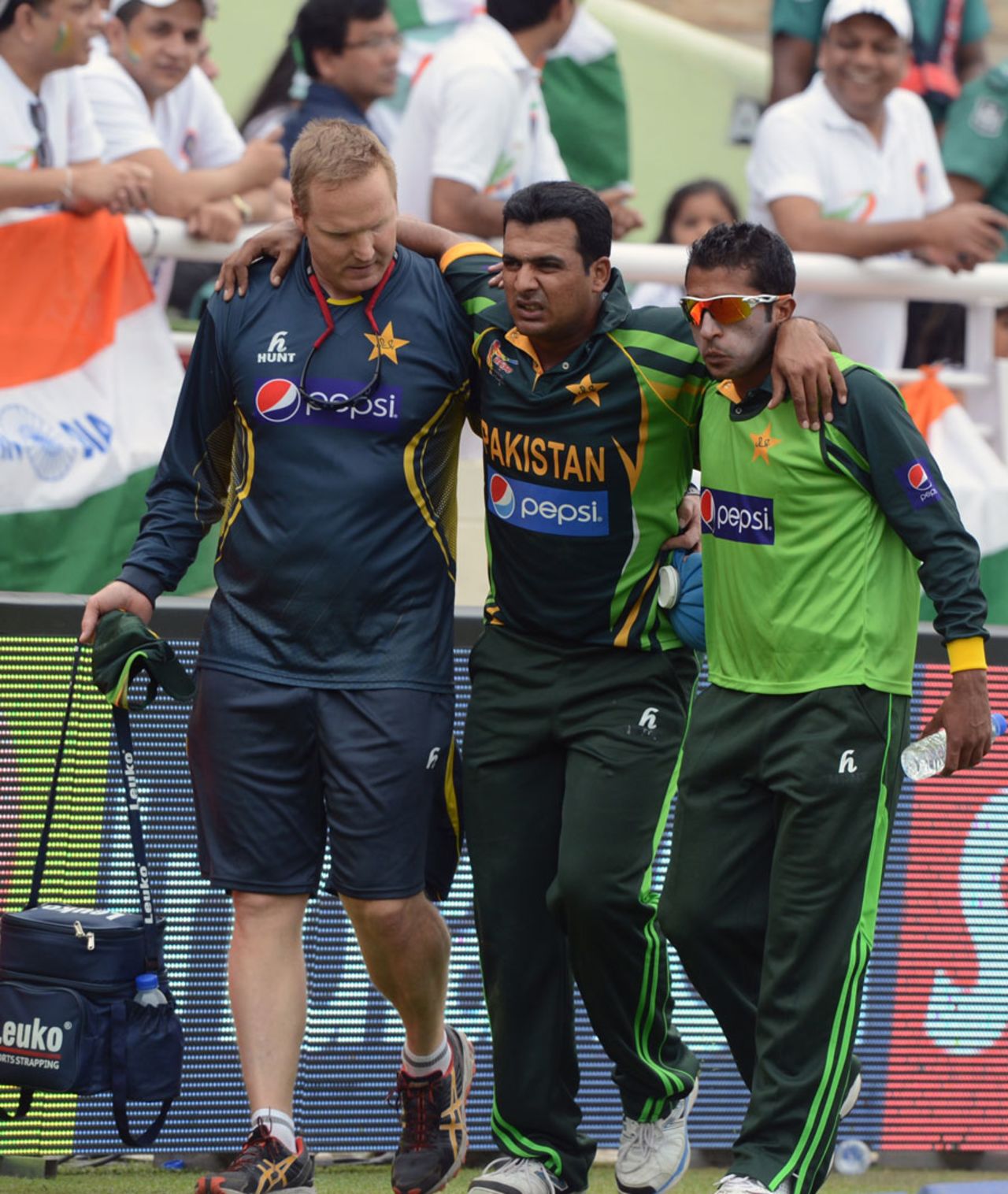 Sharjeel Khan is taken off the field with an injury, India v Pakistan, Asia Cup, Mirpur, March 2, 2014