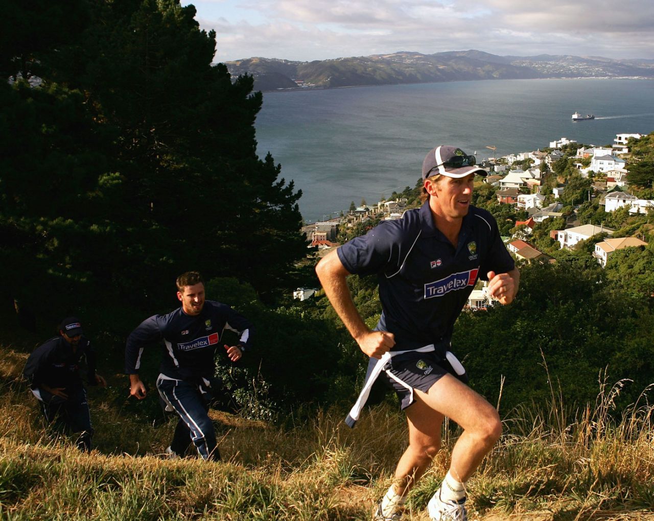Glenn McGrath, Michael Kasprowicz and Jason Gillespie climb Mount Victoria in Wellington, March 15, 2005