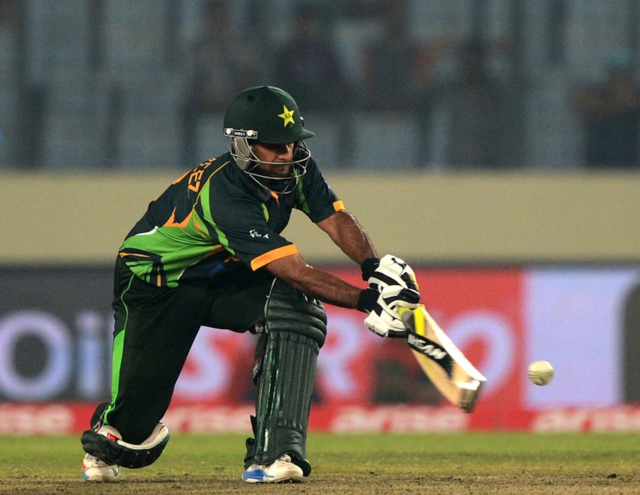 Mohammad Hafeez executes a sweep, India v Pakistan, Asia Cup, Mirpur, March 2, 2014