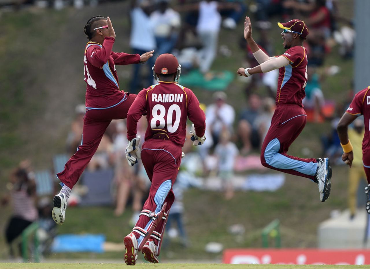 Sunil Narine jumps in celebration of removing Luke Wright, West Indies v England, 2nd ODI, North Sound, March 2, 2014