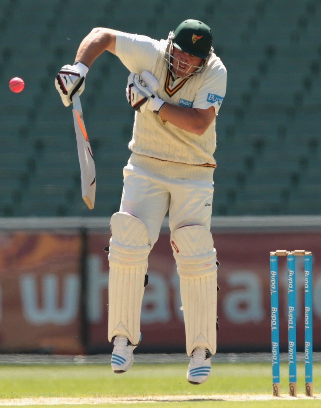 Mark Cosgrove fends off the pink ball, Victoria v Tasmania, Sheffield Shield, Melbourne, 1st day, March 3, 2014