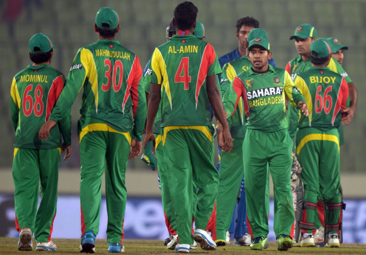 Bangladesh players shake hands with each other, Bangladesh v Sri Lanka, Asia Cup, Mirpur, March 6, 2014