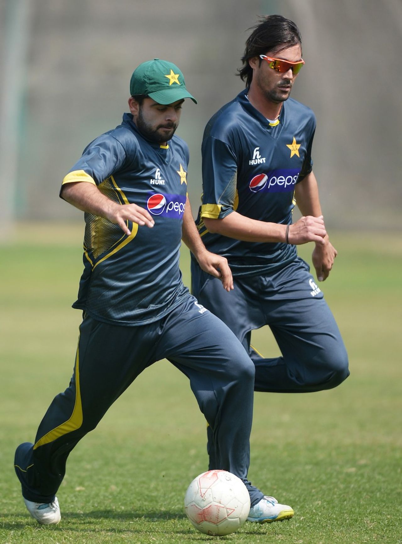 Ahmed Shehzad and Anwar Ali play football on the eve of the Asia Cup final, Mirpur, March 7, 2014