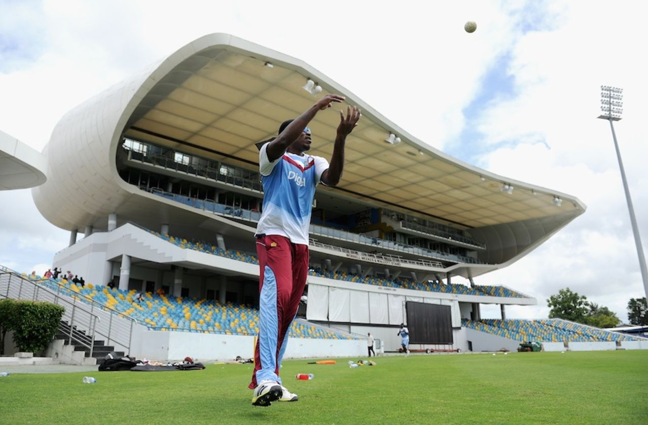 Chris Gayle engages in a fielding drill, Bridgetown, March 7, 2014