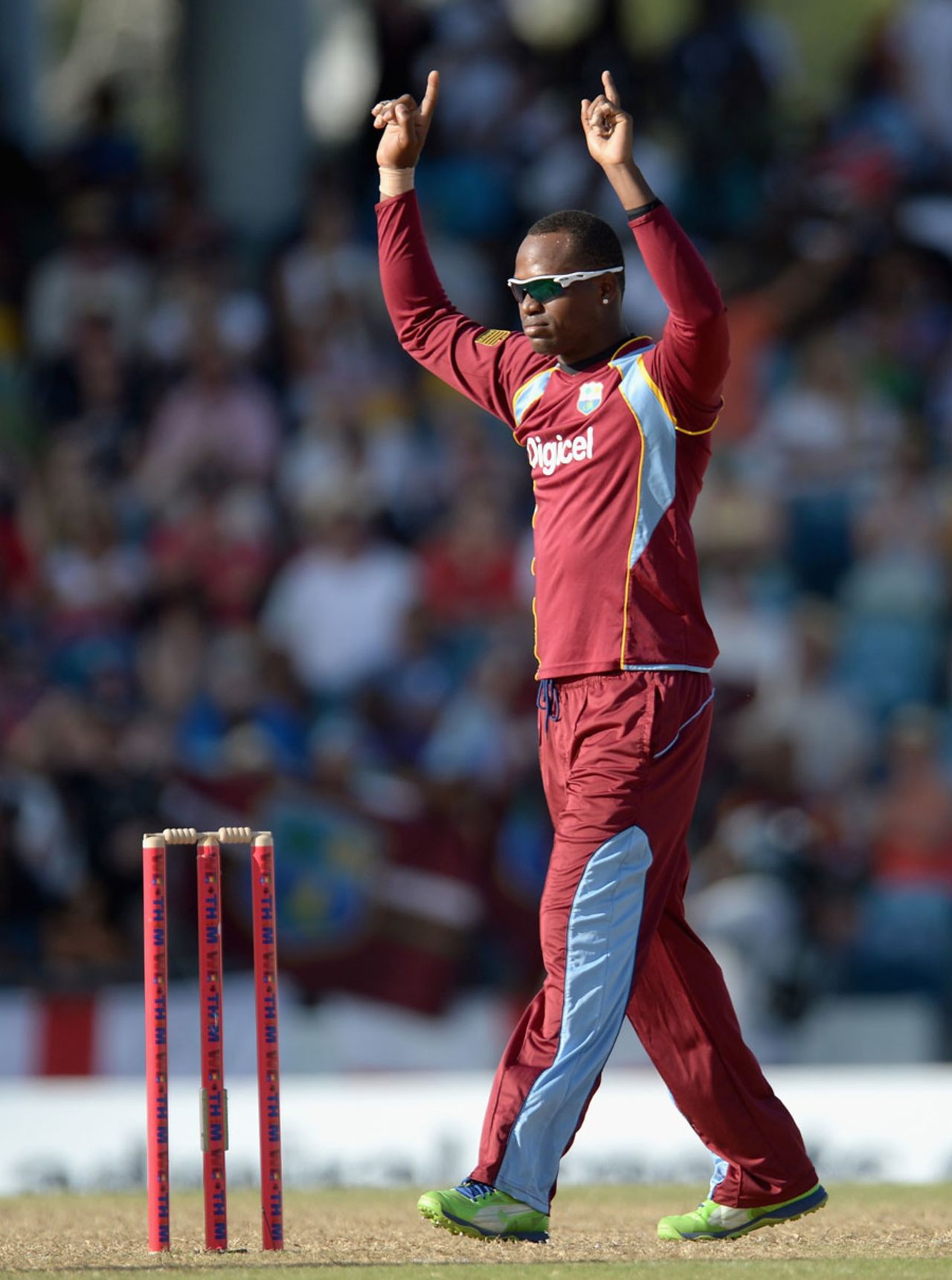 Marlon Samuels followed up his runs with key wickets, West Indies v England, 1st T20, Barbados, March 9, 2014