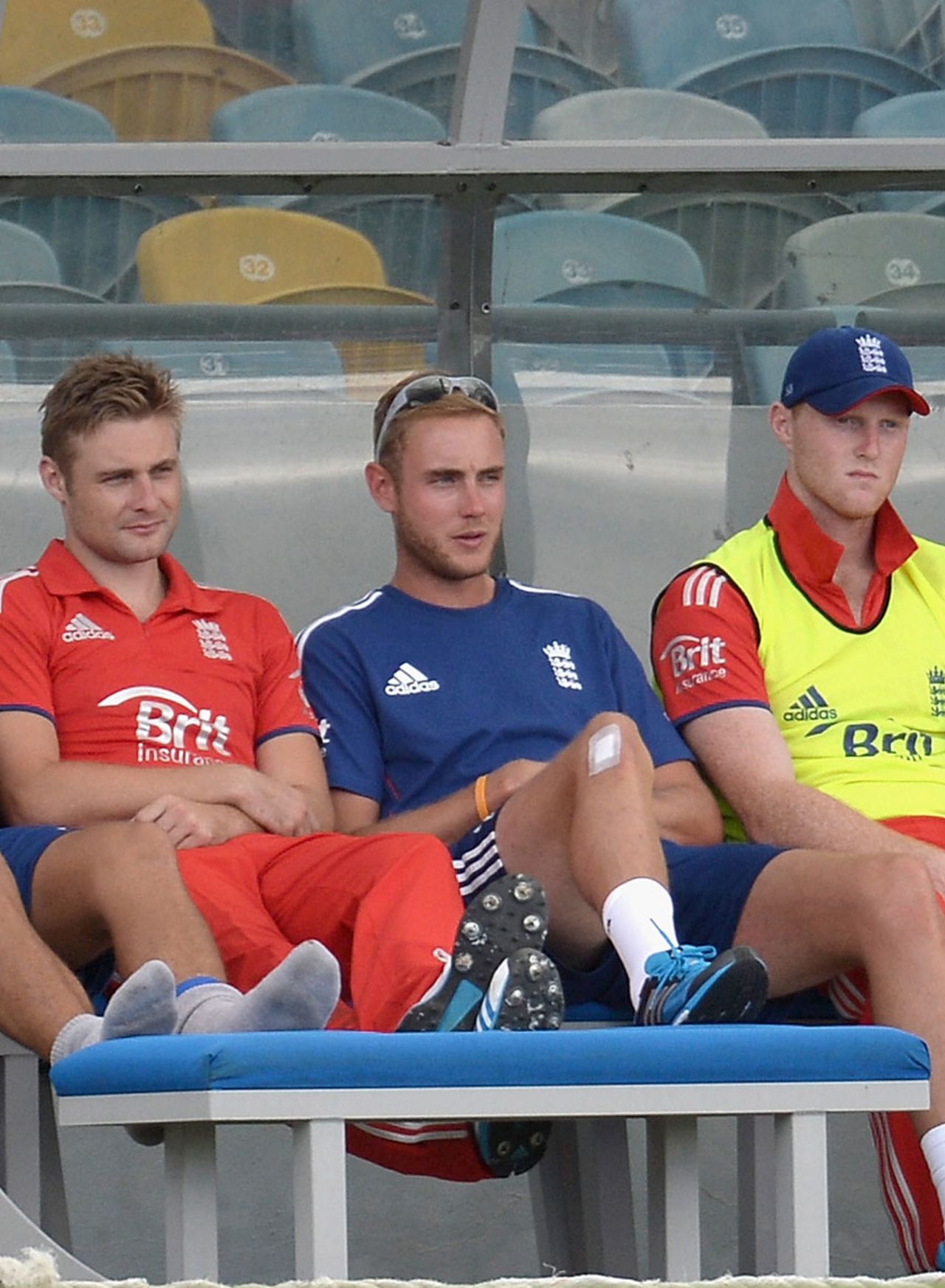 Stuart Broad watches from the sidelines with a plaster on his troublesome knee, West Indies v England, 2nd T20, Barbados, March 11, 2014