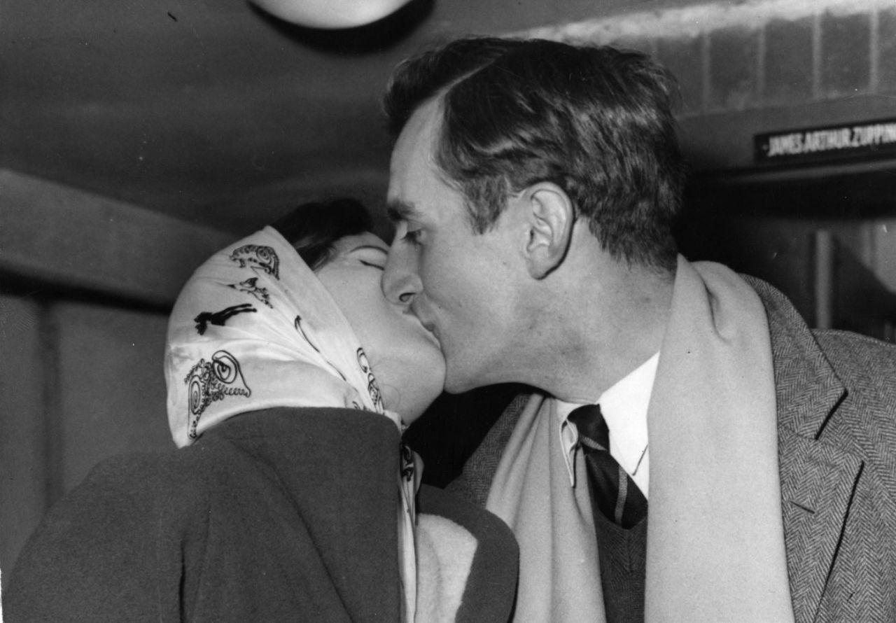 Ted Dexter kisses his fiancee at Heathrow before leaving for Australia, December 5, 1958
