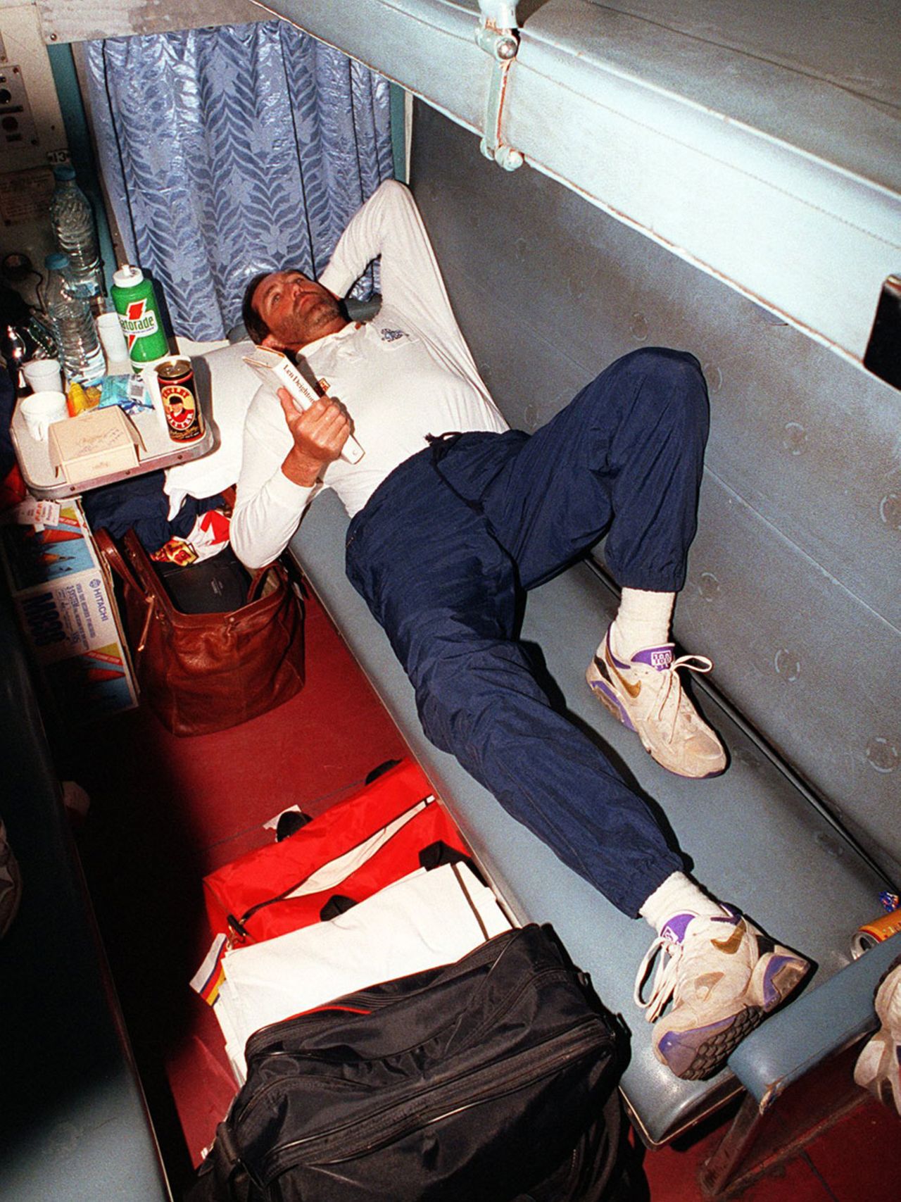 Graham Gooch lies down in his berth on the train to Calcutta, January 26, 1993