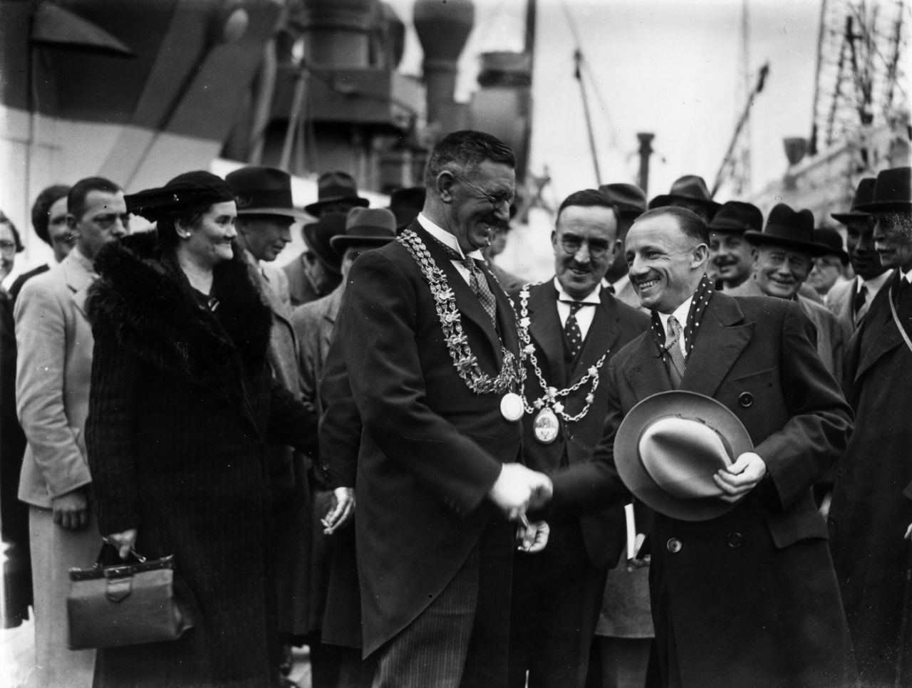 Australian captain Don Bradman is greeted by deputy mayor of Southampton on the team's arrival for the Ashes, April 20, 1938
