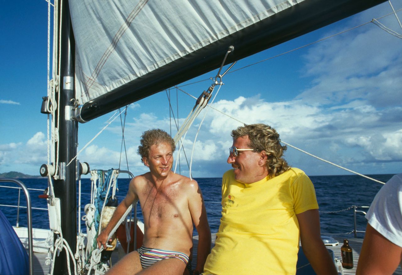 David Gower and Ian Botham relax on a yacht in the Caribbean, 1986
