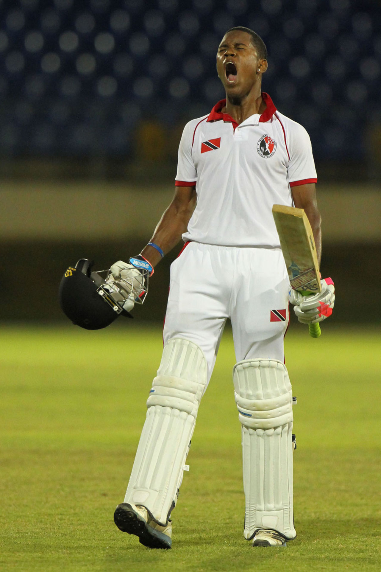 Akeal Hosein celebrates his century, Trinidad & Tobago v Leeward Islands, Trinidad, 2nd day, March 15, 2014