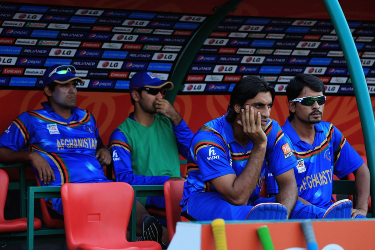 A glum Afghanistan dugout surveys proceedings, Bangladesh v Afghanistan, World T20, Qualifying Group A, March 16, 2014