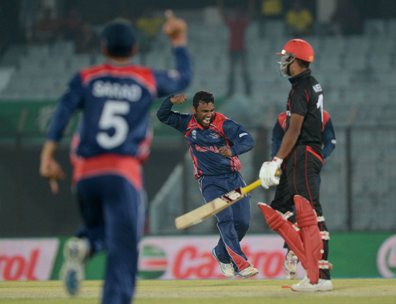 Jitendra Mukhiya celebrates the final Hong Kong wicket, Hong Kong v Nepal, World T20, Qualifying Group A, Chittagong, March 16, 2014 