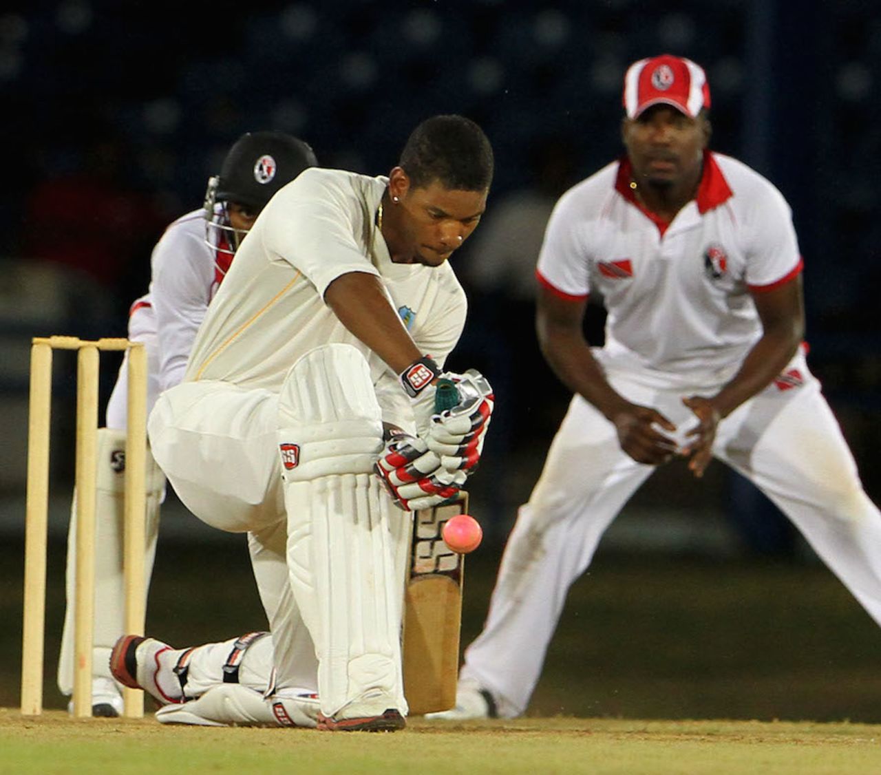 Kieran Powell plays a defensive stroke while Darren Bravo looks on, Trinidad & Tobago v Leeward Islands, Trinidad, 3rd day, March 16, 2014