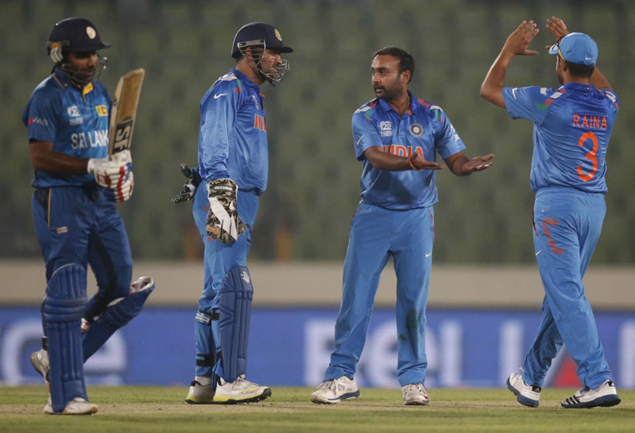 Amit Mishra celebrates after dismissing Mahela Jayawardene, India v Sri Lanka, World Twenty20, warm-up, Mirpur, March 17, 2014