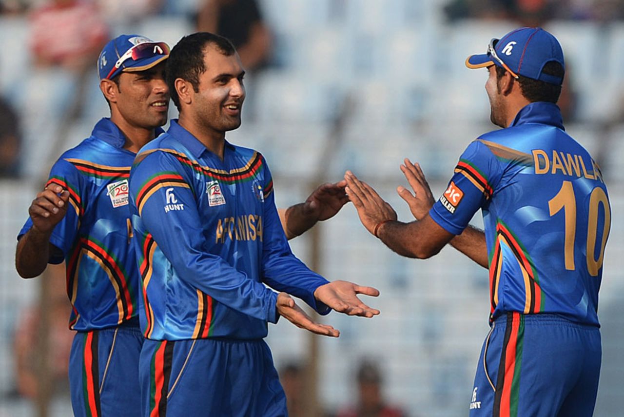 Mohammad Nabi celebrates a wicket with his team-mates, Afghanistan v Hong Kong, World T20, Group A, Chittagong, March 18, 2014