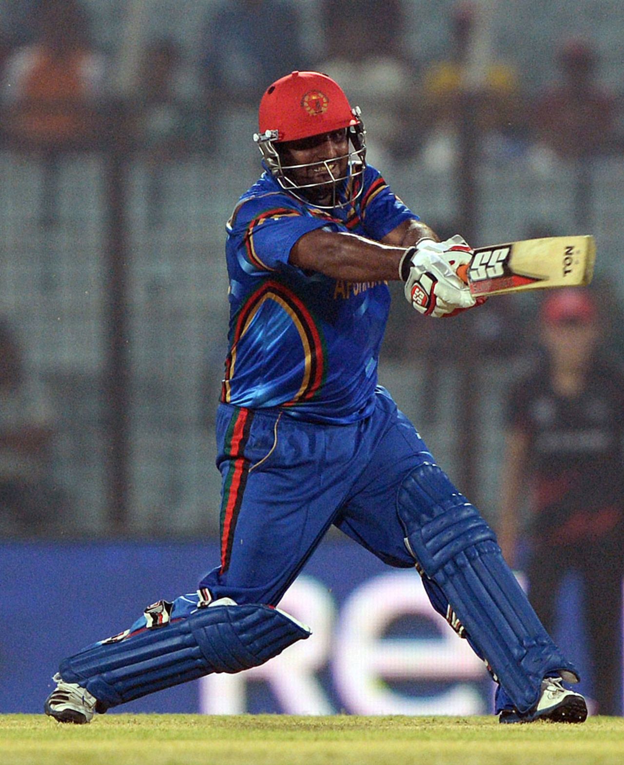 Mohammad Shahzad tries to swat one away, Afghanistan v Hong Kong, World T20, Group A, Chittagong, March 18, 2014
