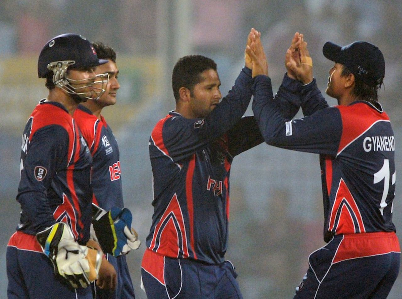 Basant Regmi is congratulated after dismissing Tamim Iqbal, Bangladesh v Nepal, World T20, Group A, Chittagong, March 18, 2014