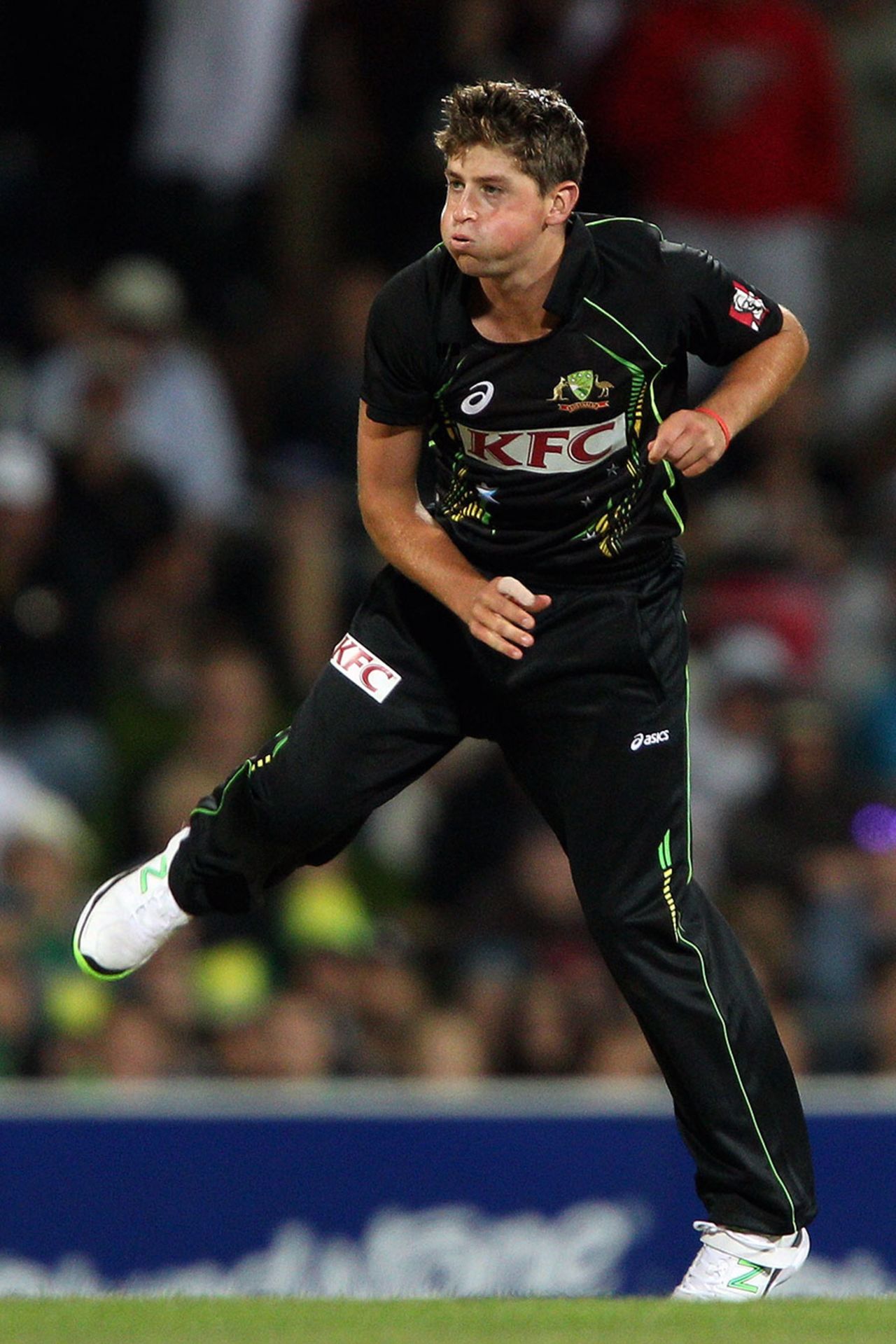 James Muirhead in his follow-through, Australia v England, 1st T20, Hobart, January 29, 2014