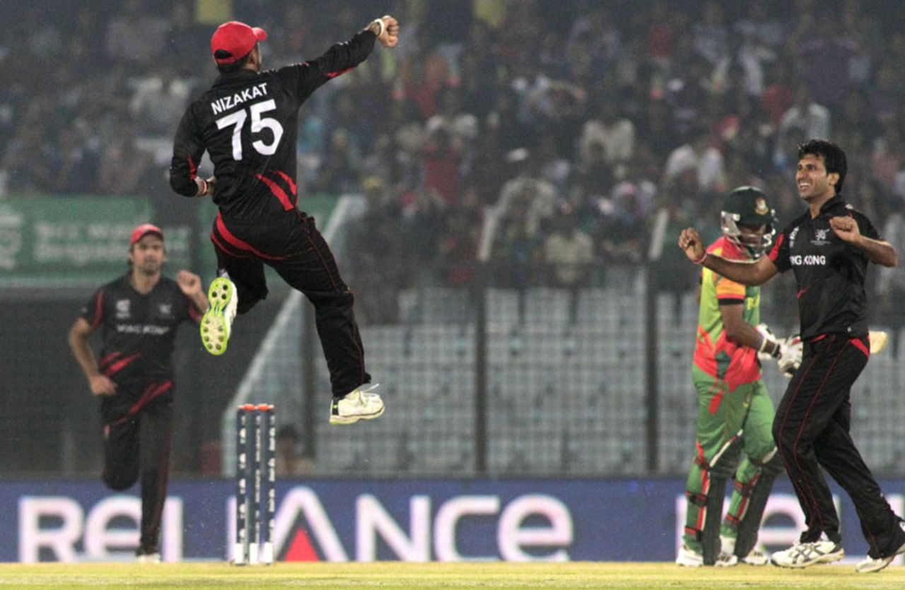 Nizakat Khan and Tanwir Afzal celebrate a wicket, Bangladesh v Hong Kong, World T20, Group A, Chittagong, March 20, 2014