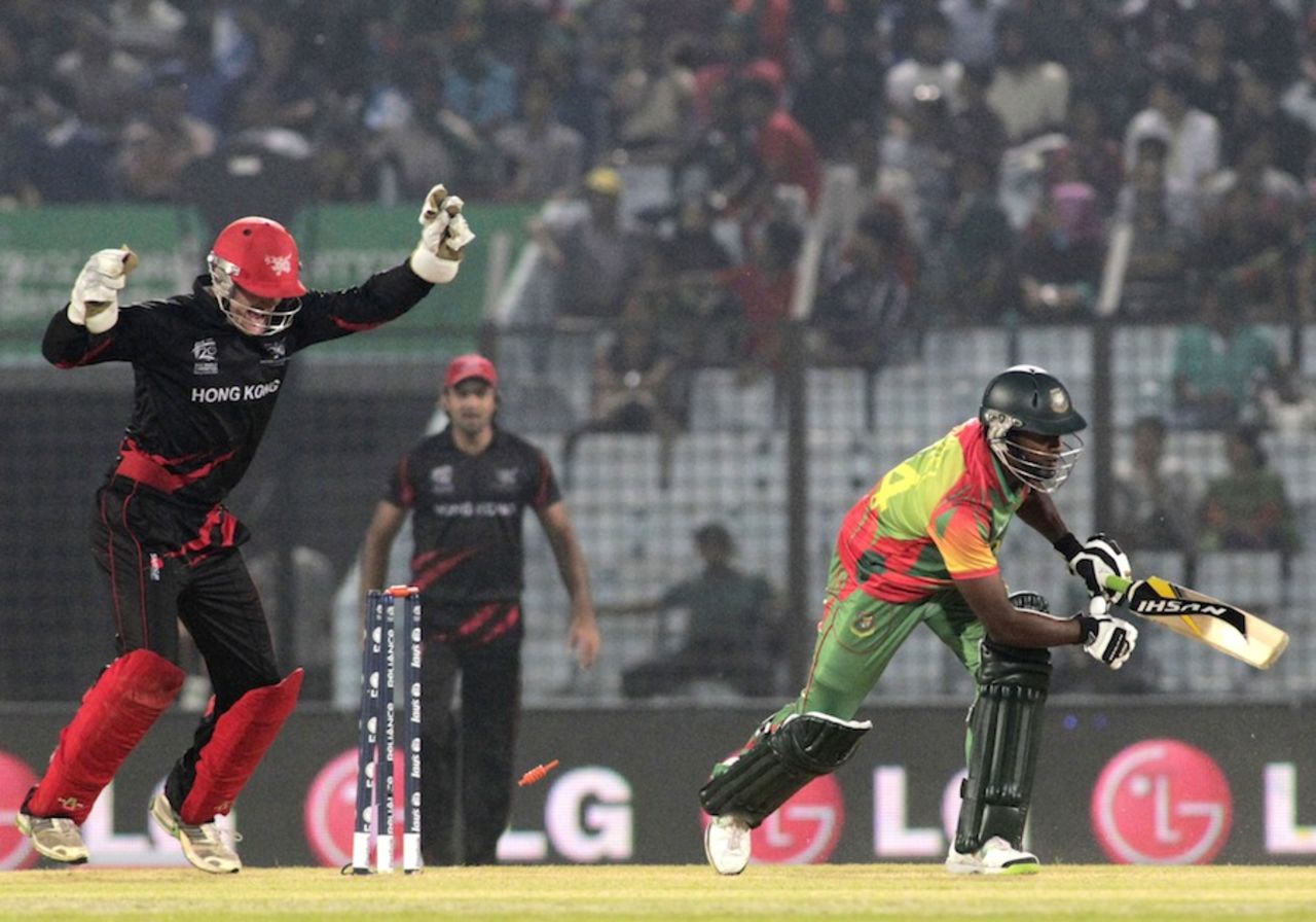 Jamie Atkinson is elated to see Rubel Hossain is bowled, Bangladesh v Hong Kong, World T20, Group A, Chittagong, March 20, 2014