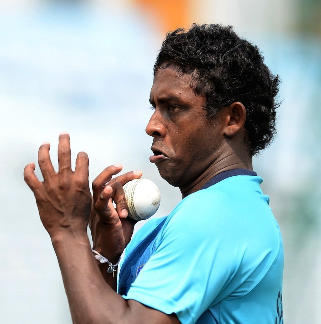 The twister: Ajantha Mendis bowls during a practice session, Chittagong, March 21, 2014