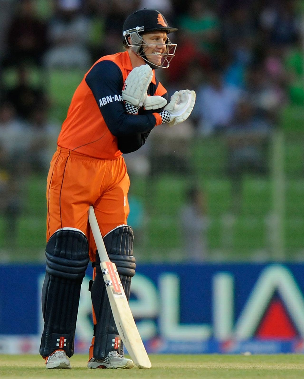Stephan Myburgh celebrates after reaching his half-century, Ireland v Netherlands, World T20, First Round Group B, Sylhet, March 21, 2014