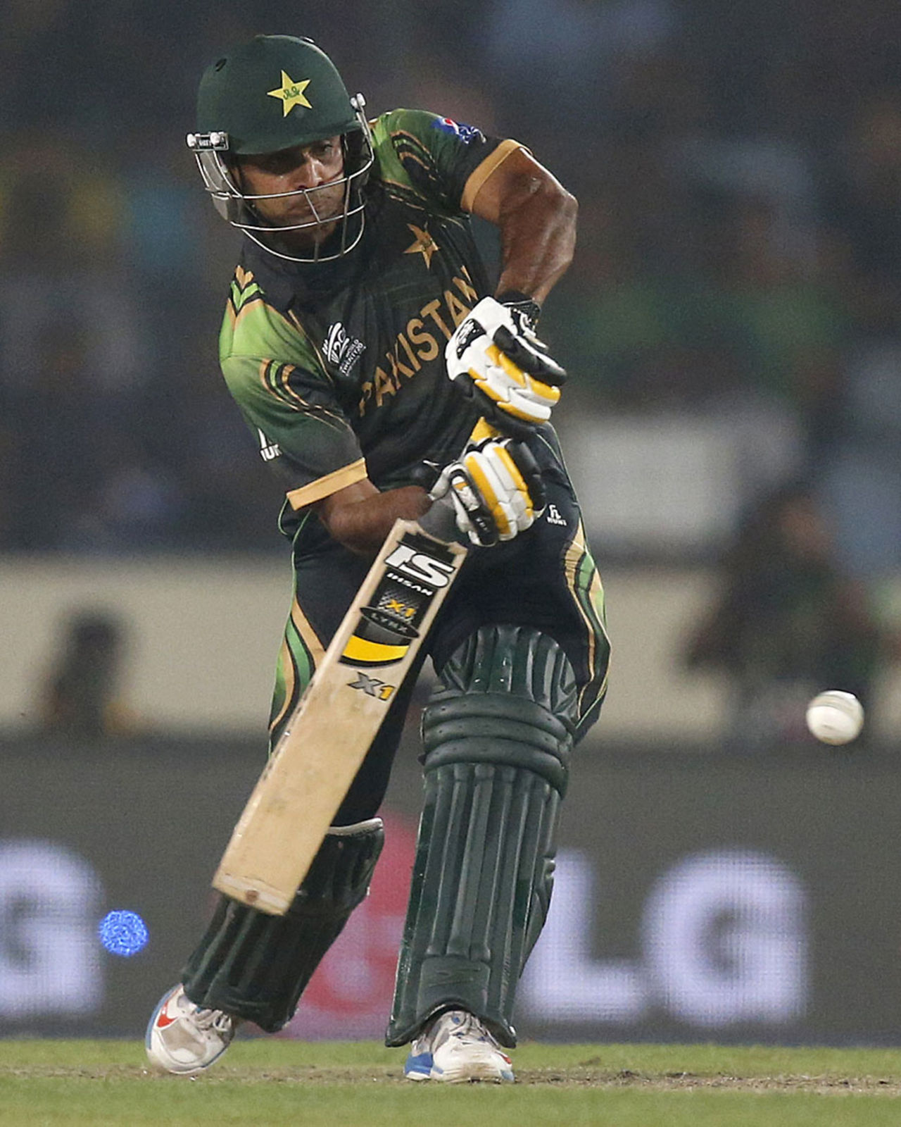 Mohammad Hafeez goes for a big hit, India v Pakistan, World T20, Group 2, Mirpur, March 21, 2014 
