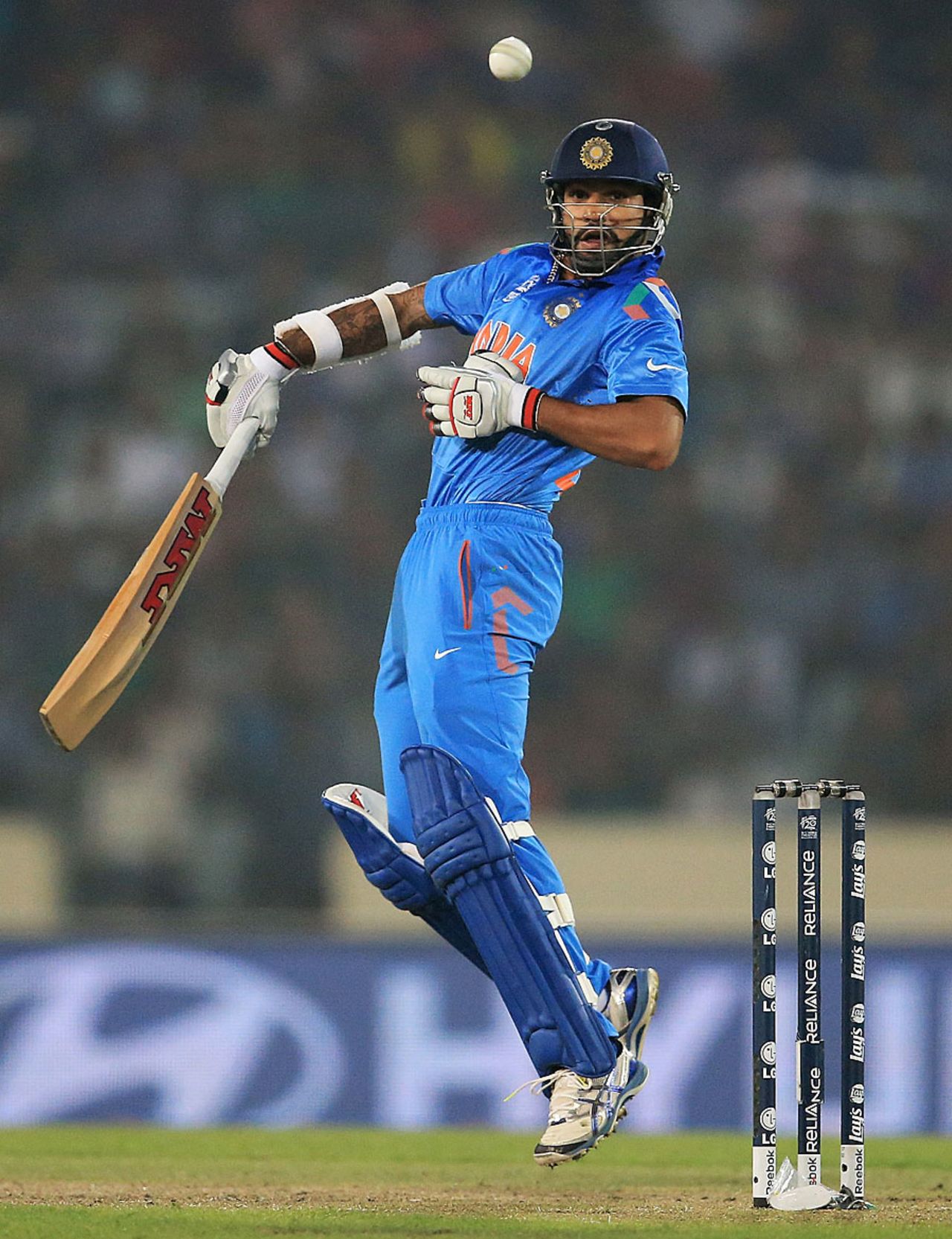 Shikhar Dhawan fends off a short ball, India v Pakistan, World T20, Group 2, Mirpur, March 21, 2014 