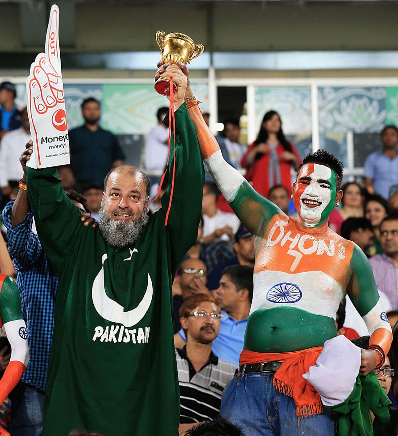 Rivalry on the pitch, friendliness in the stands, as two fans demonstrate, India v Pakistan, World T20, Group 2, Mirpur, March 21, 2014 