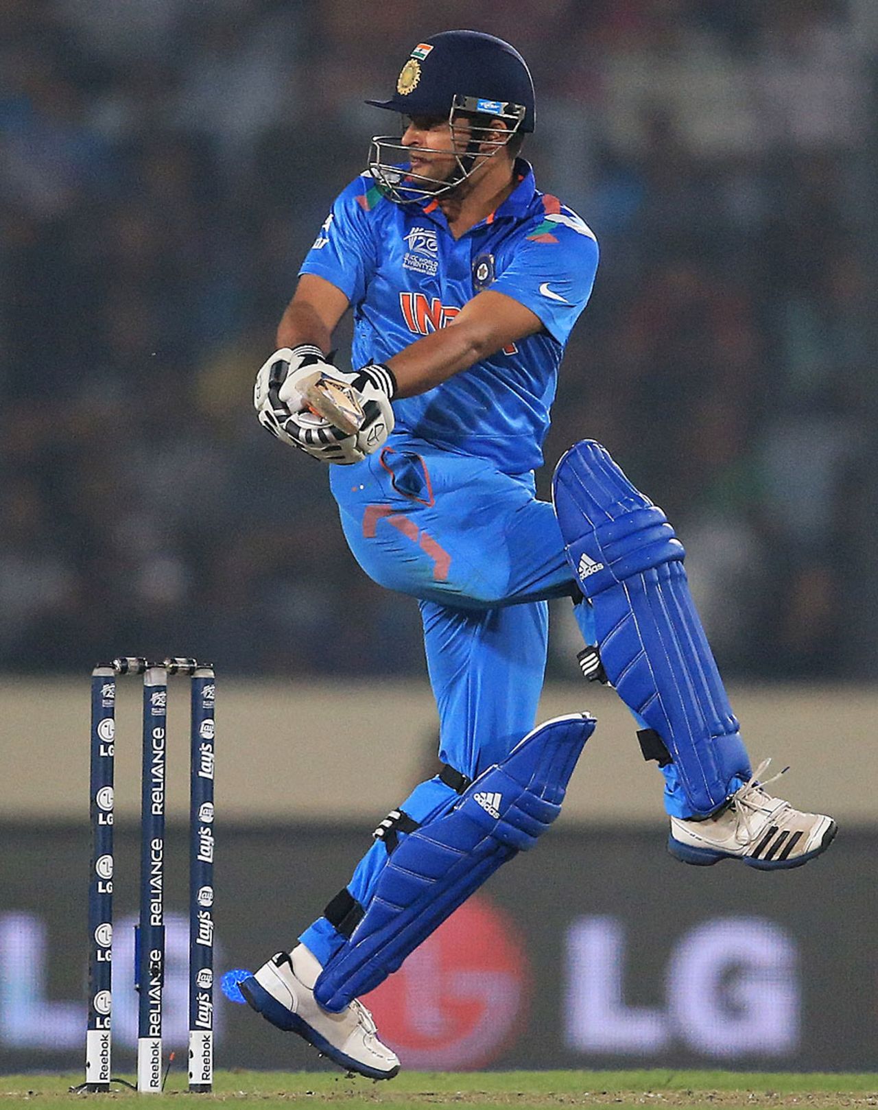 Suresh Raina plays a one-legged pull, India v Pakistan, World T20, Group 2, Mirpur, March 21, 2014 