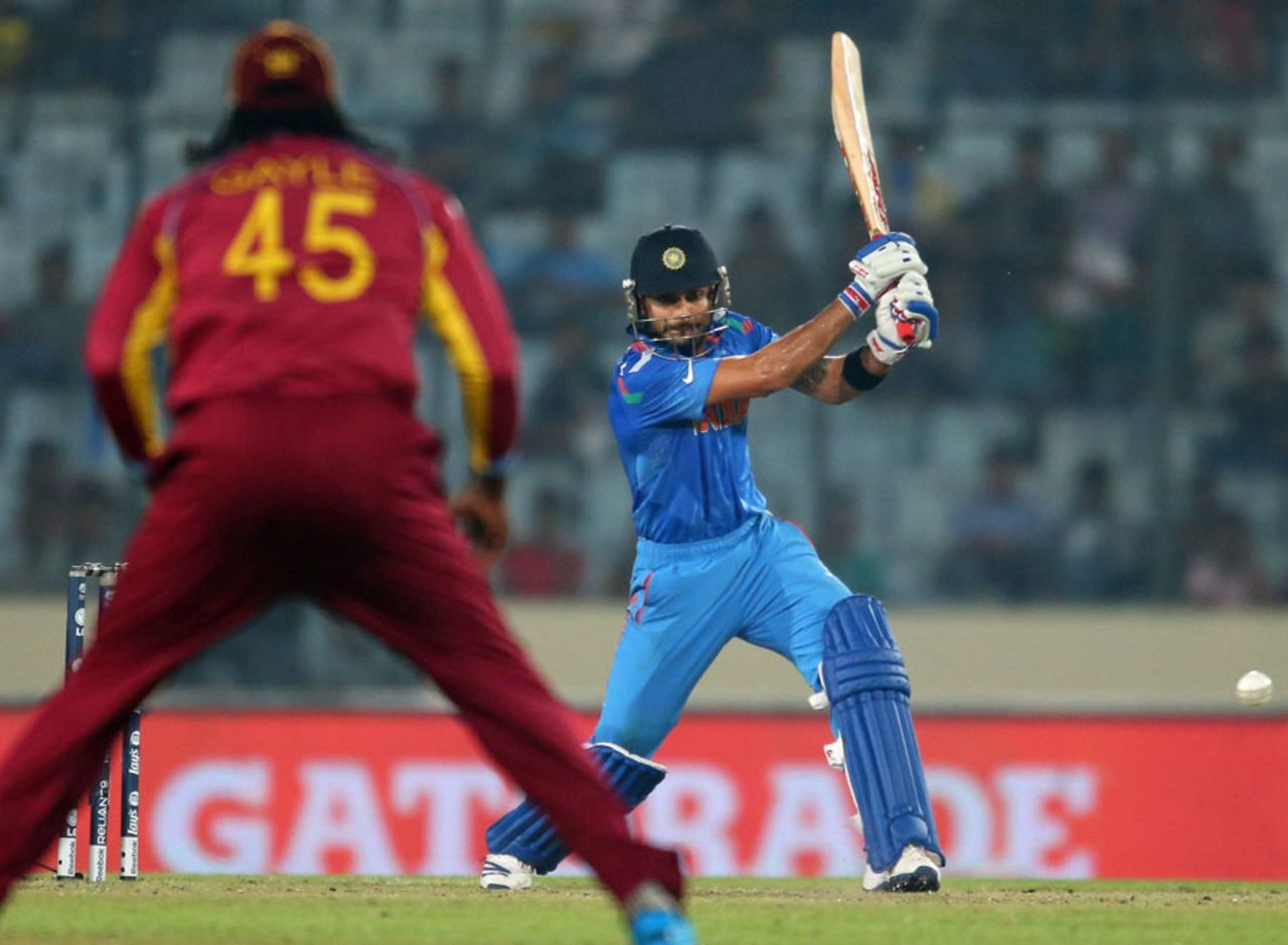 Virat Kohli unfurls a drive,  India v West Indies, World T20, Group 2, Mirpur, March 23, 2014
