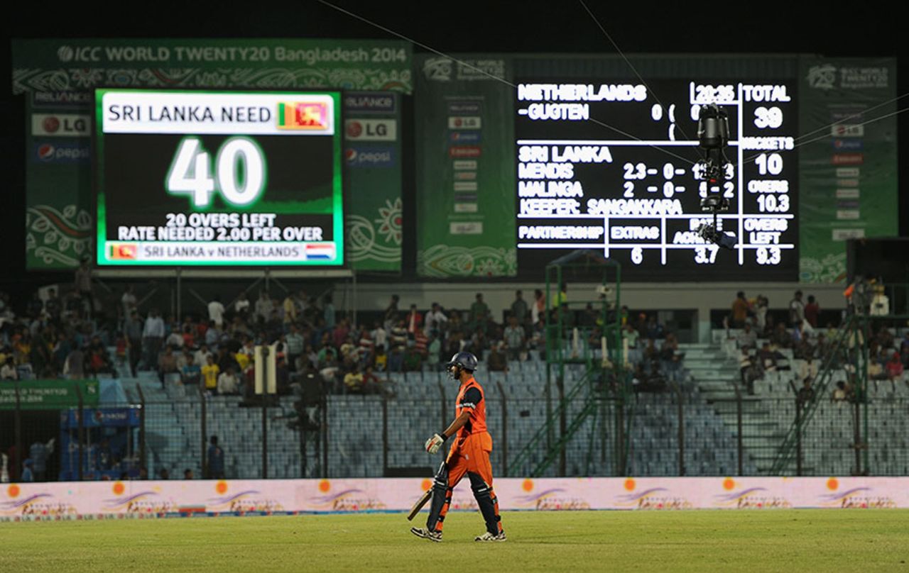 Ahsan Malik walks back as the scoreboard confirms Netherlands' plight, Netherlands v Sri Lanka, World T20, Group 1, March 24, 2014