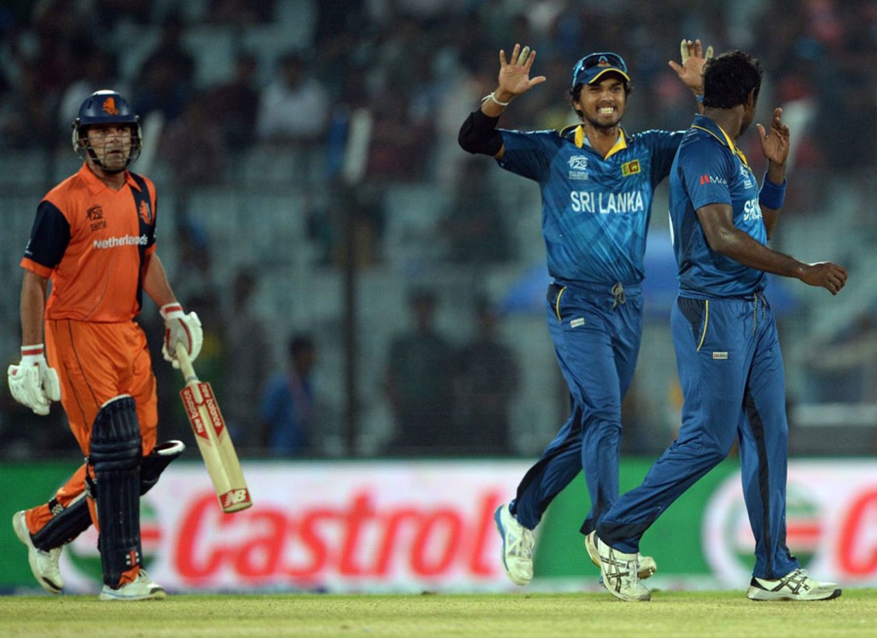 Nuwan Kulasekara got the first breakthrough for Sri Lanka,Dinesh Chandimal celebrates Peter Borren's wicket with Angelo Mathews, Netherlands v Sri Lanka, World T20, Group 1, March 24, 2014
