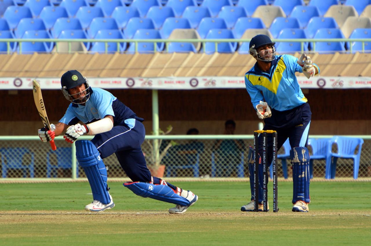 Cheteshwar Pujara works the ball into the leg side, North Zone v West Zone, Deodhar Trophy, final, Visakhapatnam, March 27, 2014