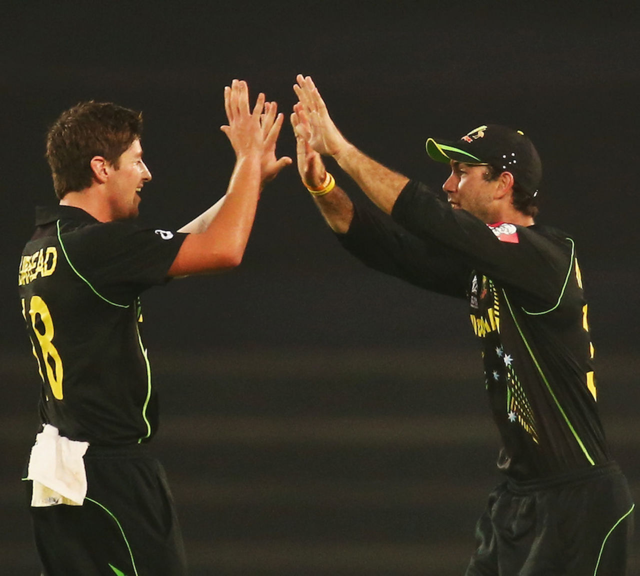 James Muirhead and Glenn Maxwell celebrate the wicket of Chris Gayle, Australia v West Indies, World T20, Group 2, Mirpur, March 28, 2014
