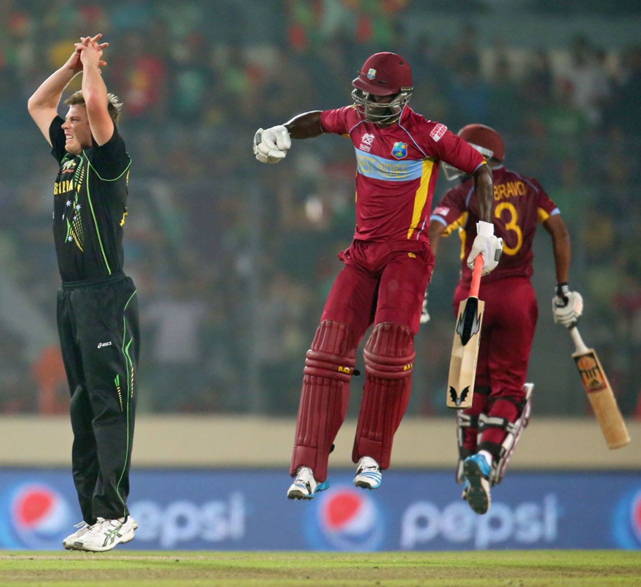James Faulkner reacts after Darren Sammy finishes the match with a six, Australia v West Indies, World T20, Group 2, Mirpur, March 28, 2014